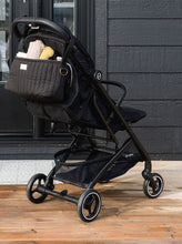 Load image into Gallery viewer, black quilted stroller organizer
